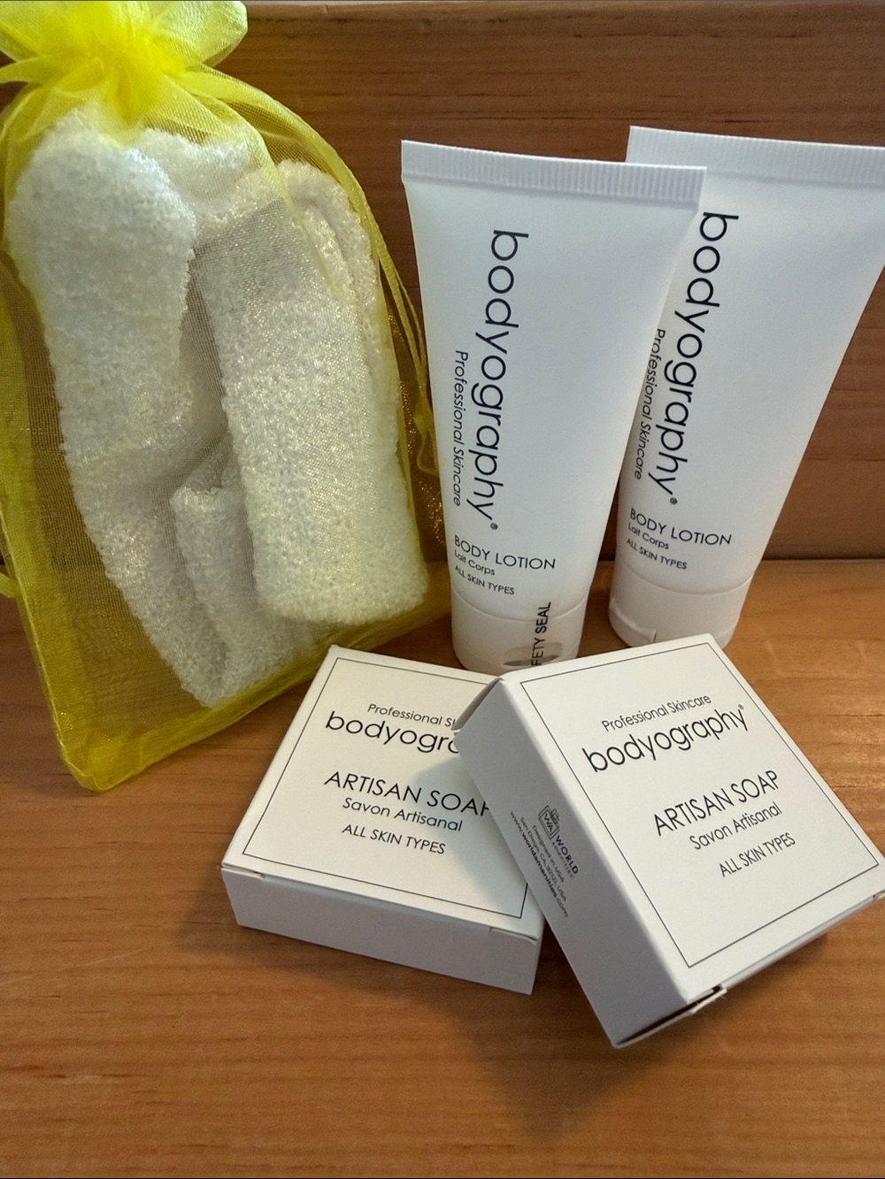 NWT 5-piece bodyography Body Care Set: body lotions, soaps, exfoliating glove